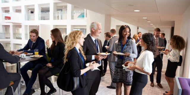 delegates-networking-during-conference-lunch-break-2024-10-21-09-58-15-utc